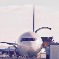 airplane being loaded with mail and packages